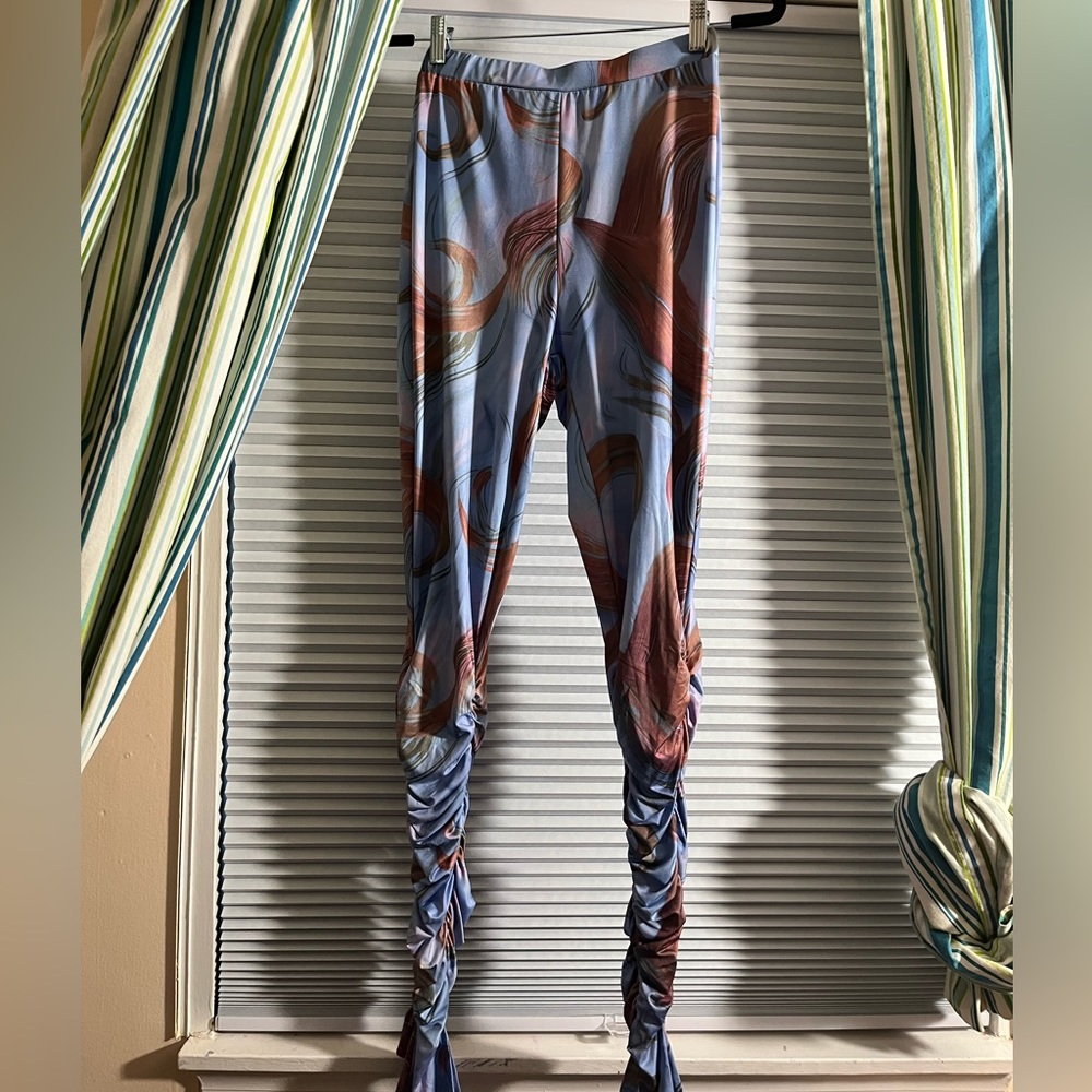 Worn once dress pants stacked